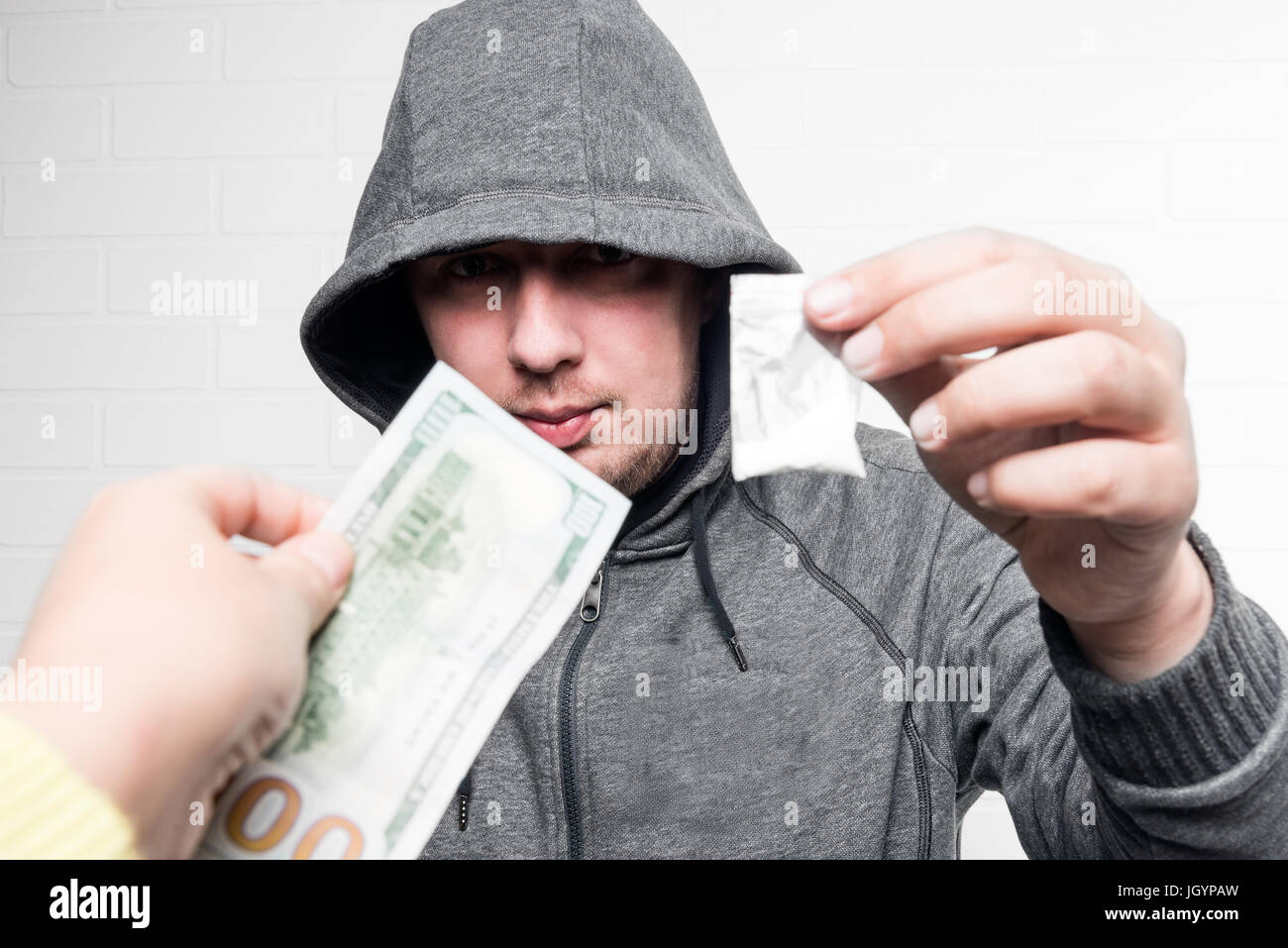 A Drug Dealer In A Hood Sells Drugs To A Girl Stock Photo Alamy A Drug Dealer In A Hood Sells Drugs To A Girl JGYPAW