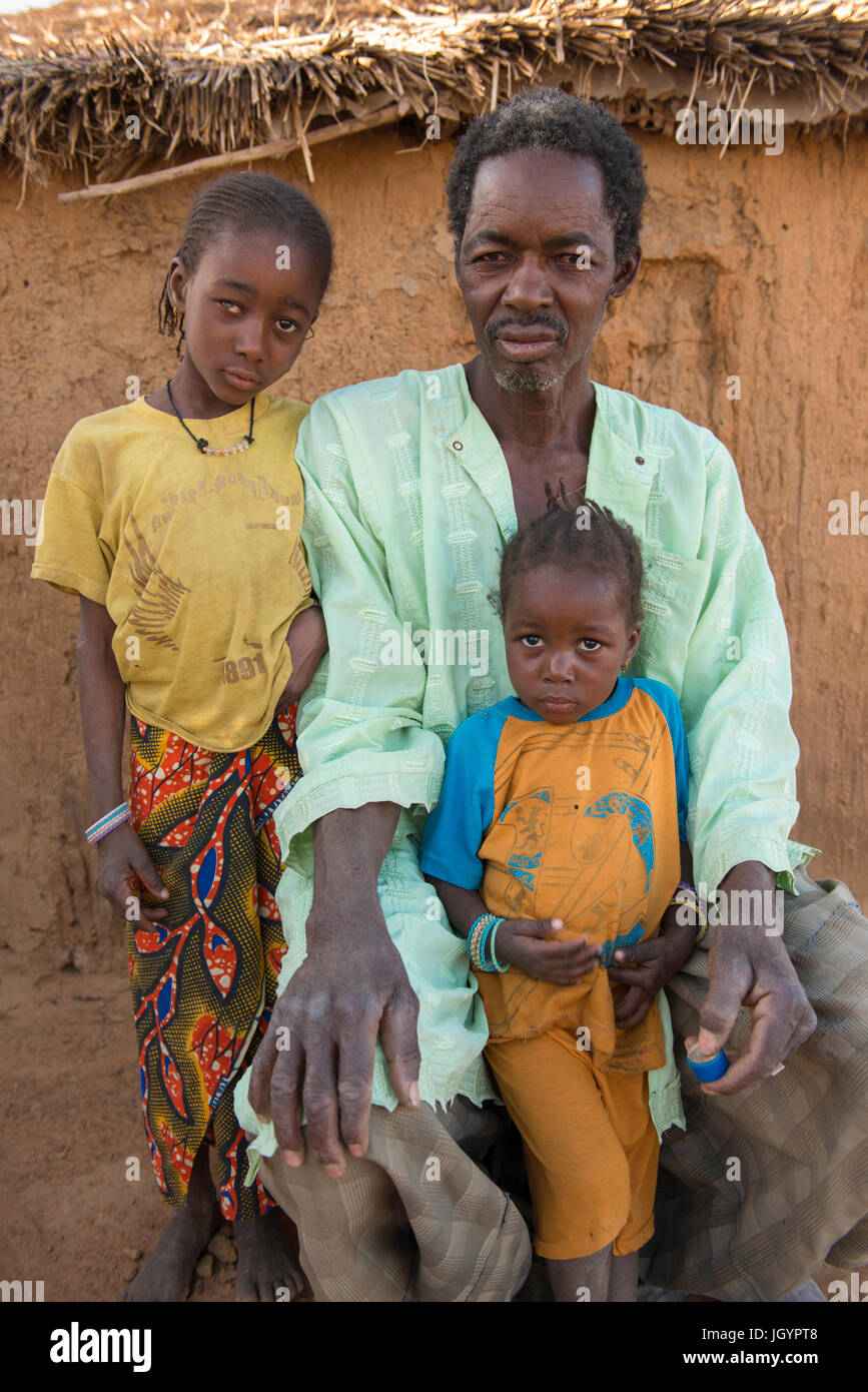 Peul father and children. Senegal. Stock Photo