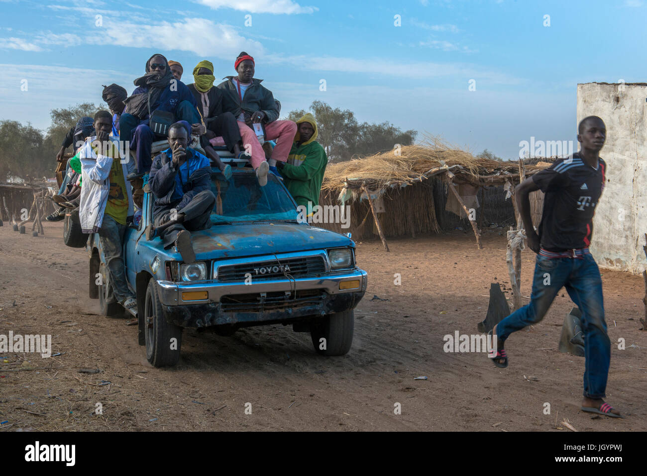 Africa Burkina Faso Ouagadougou View Of Overloaded African Car Carrying  Luggage On Roof High-Res Stock Photo - Getty Images