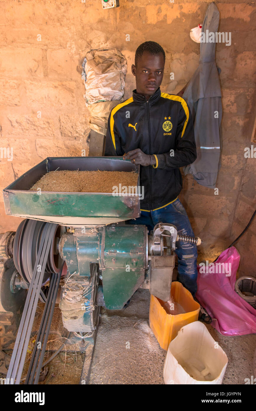 Rice husking. Senegal Stock Photo - Alamy