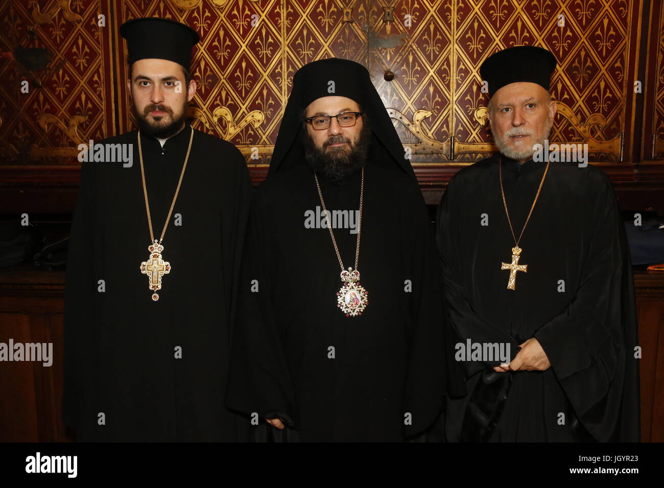 Orthodox clergy in Notre Dame catholic cathedral, Paris. Stock Photo