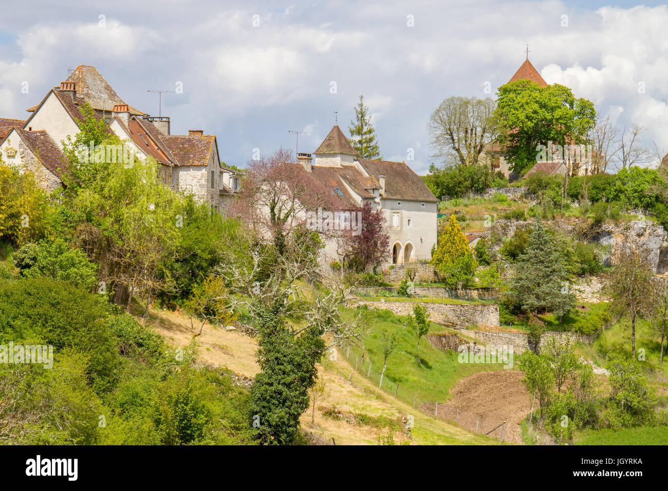 Houses in the village of Carlucet. On the Causse de Gramat, Lot Region, France. May. Stock Photo