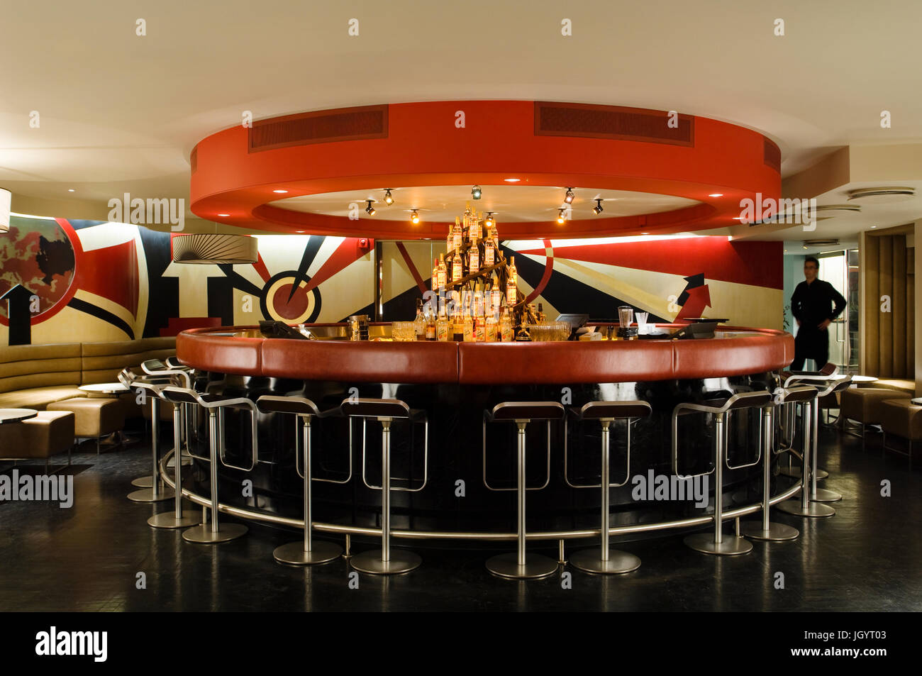Circular red bar with black stools Stock Photo