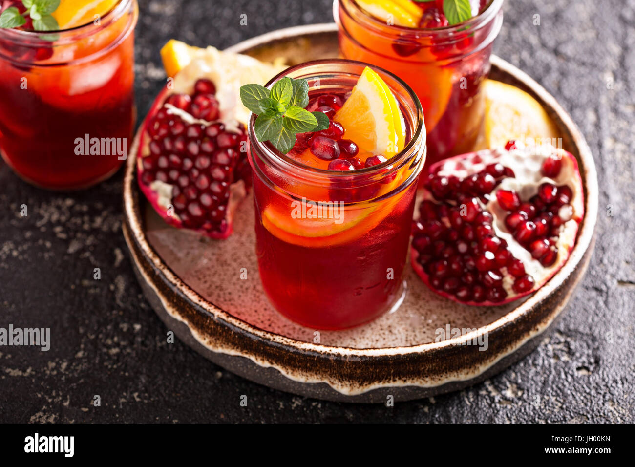 Pomegranate sangria with oranges Stock Photo