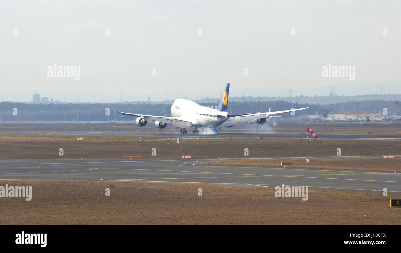 FRANKFURT, GERMANY - FEB 28th, 2015: The Lufthansa Boeing 747 - MSN 37829 - D-ABYD, named Mecklenburg-Vorpommern landing at Frankfurt International Airport FRA. The famous and powerfull aircraft nicknamed as Jumbo has first flight in 1969. The type largest operators are British Airways, Lufthansa, Korean Air and China Airlines Stock Photo