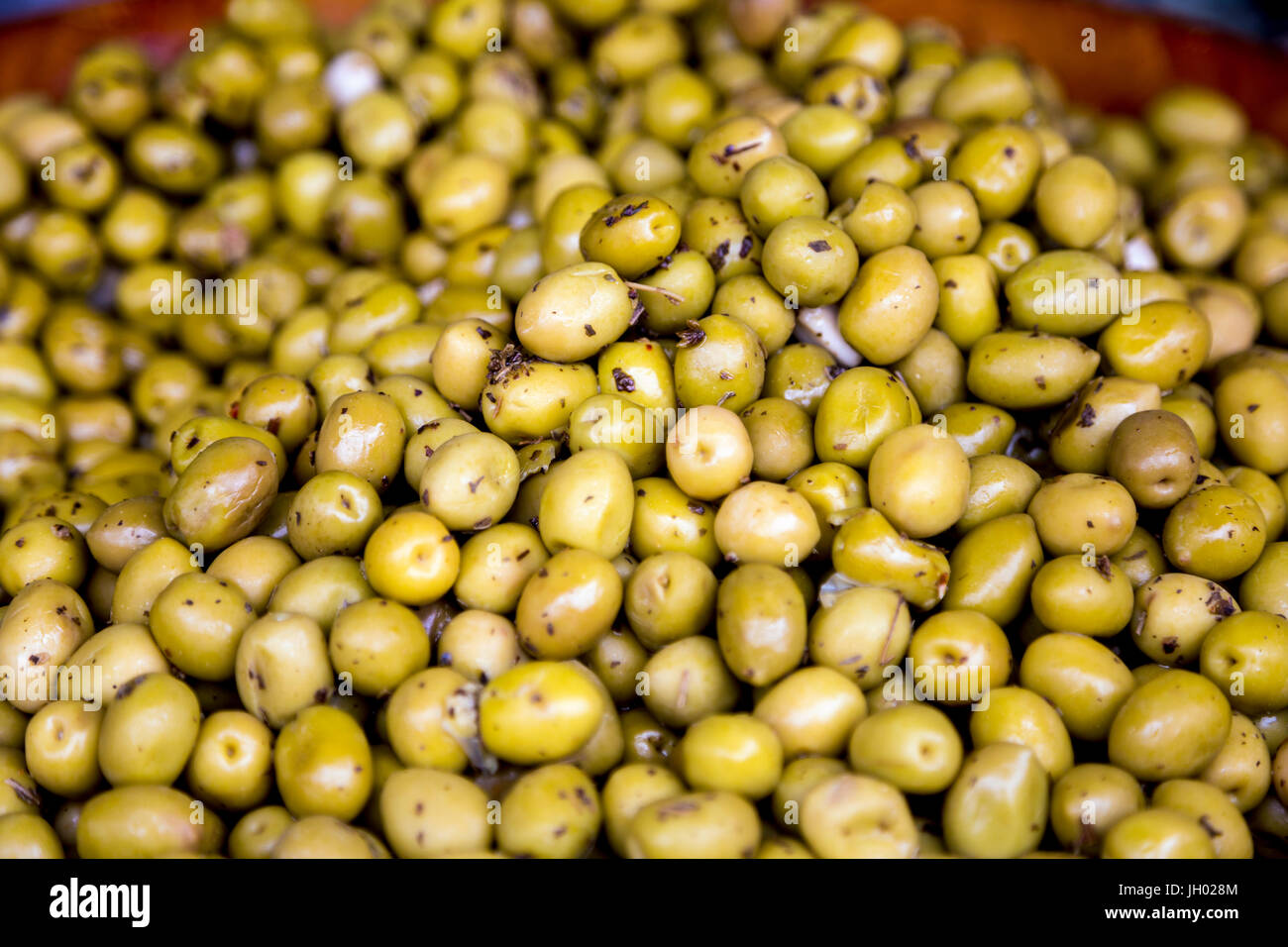 Green spiced olives at Marché de Wazemmes, Lille, France Stock Photo