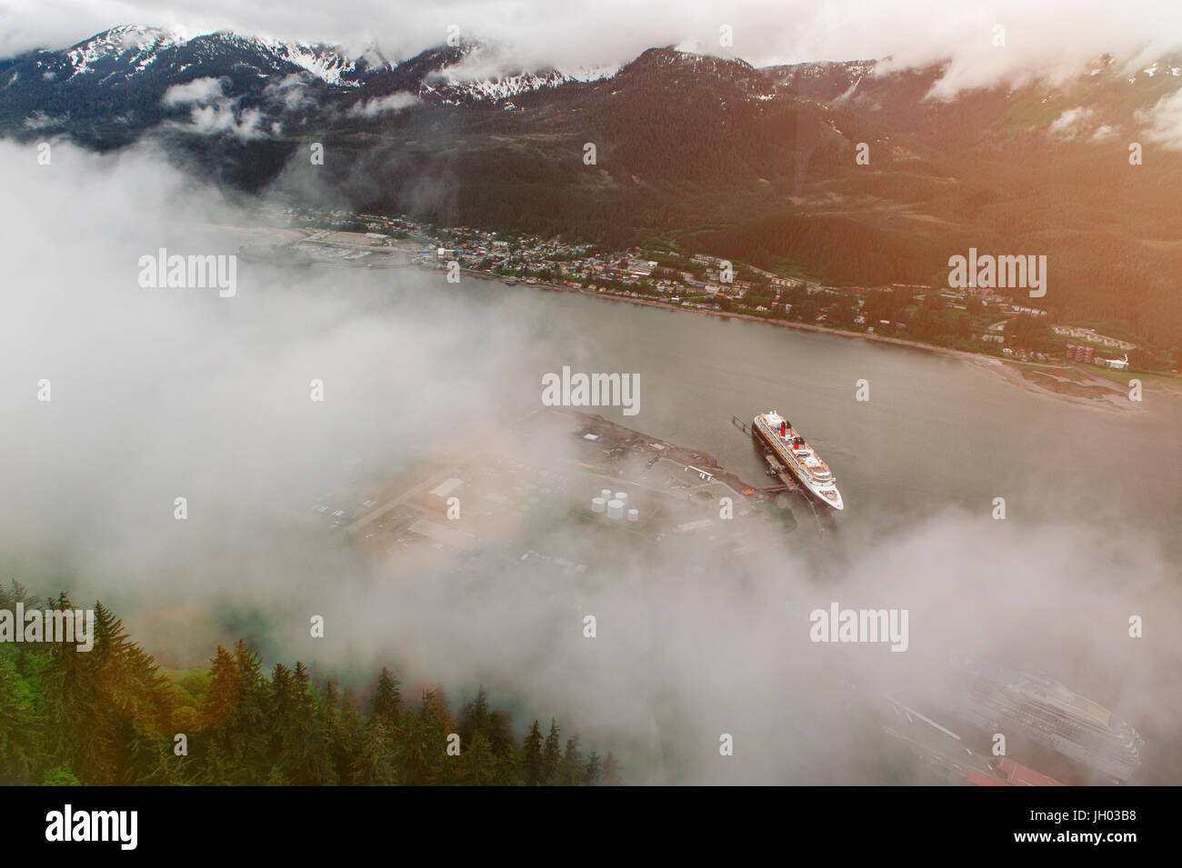 Cruise ship in alaska view from above in misty background Stock Photo