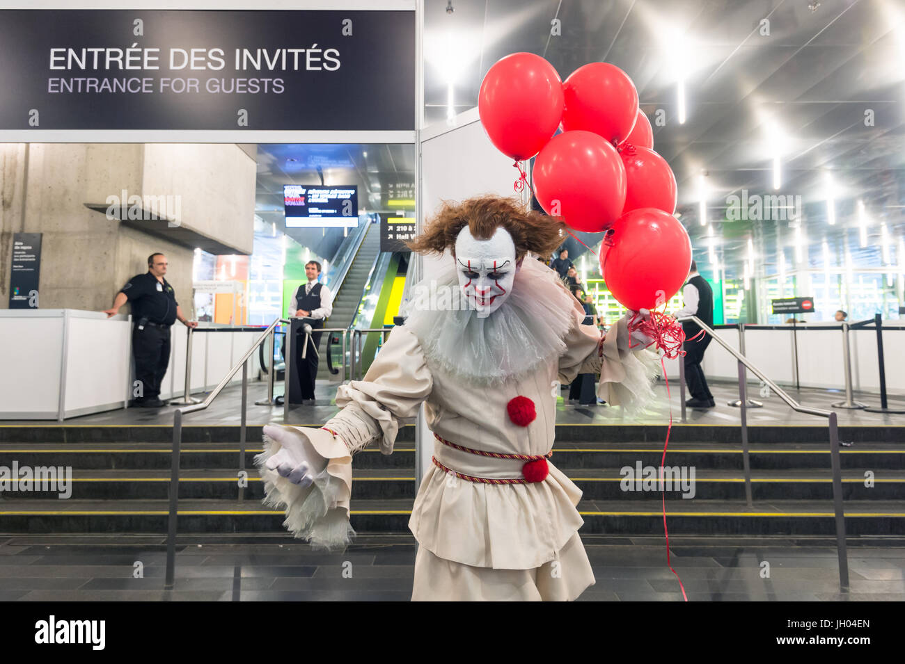 Montreal, Canada - 9 July 2017: Scary clown with balloons at Montreal ComicCon 2017. Stock Photo