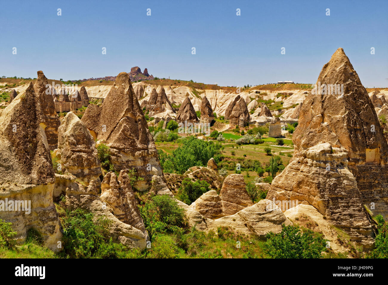 Cave dwellings and fairy chimneys at Goreme National Park, Cappadocia, Turkey Stock Photo