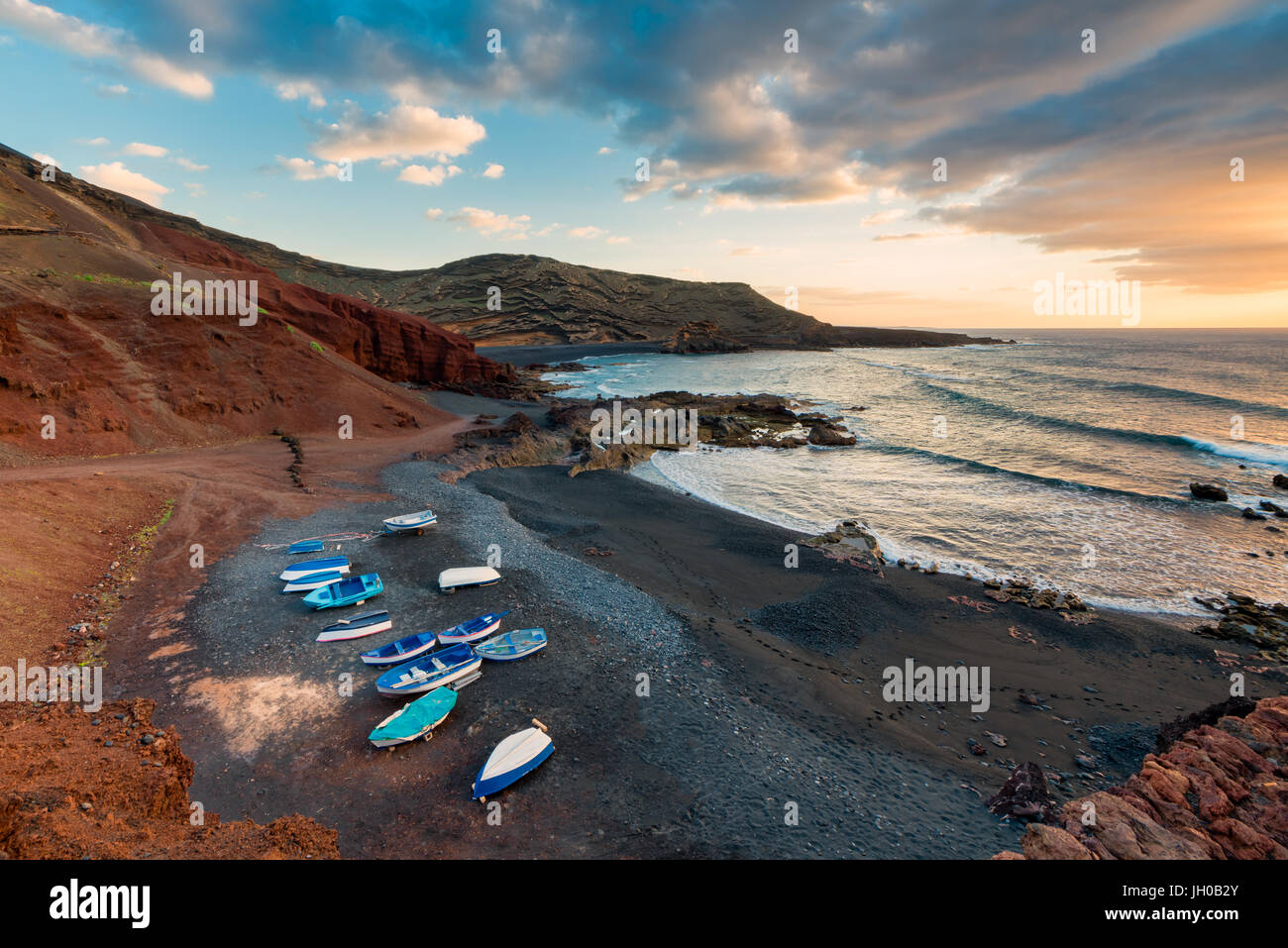 Volcanic Beach in El Golfo, Lanzarote, Canary Islands, Spain at sunset Stock Photo