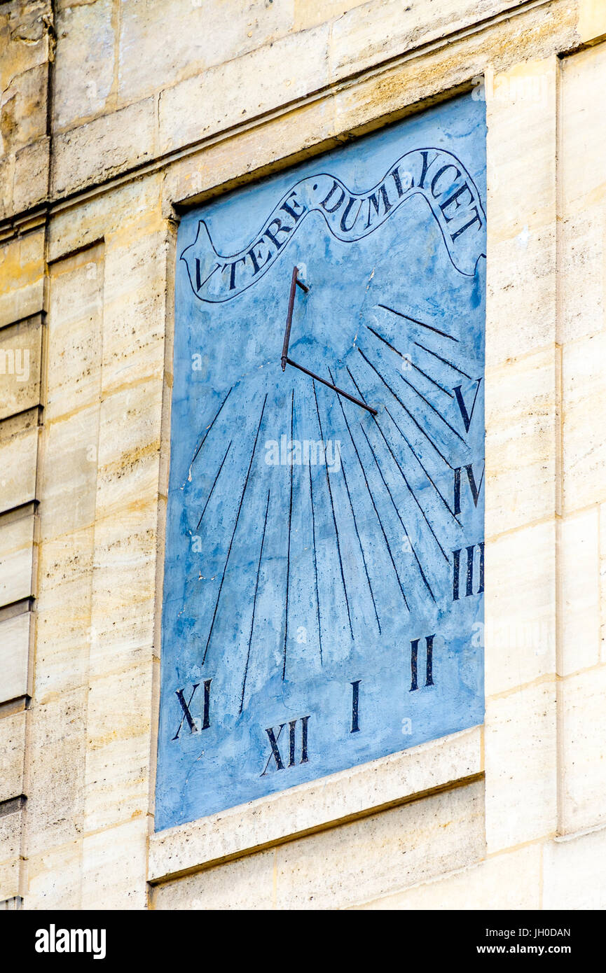 A sun dial on a Paris building in there Marais area. Stock Photo