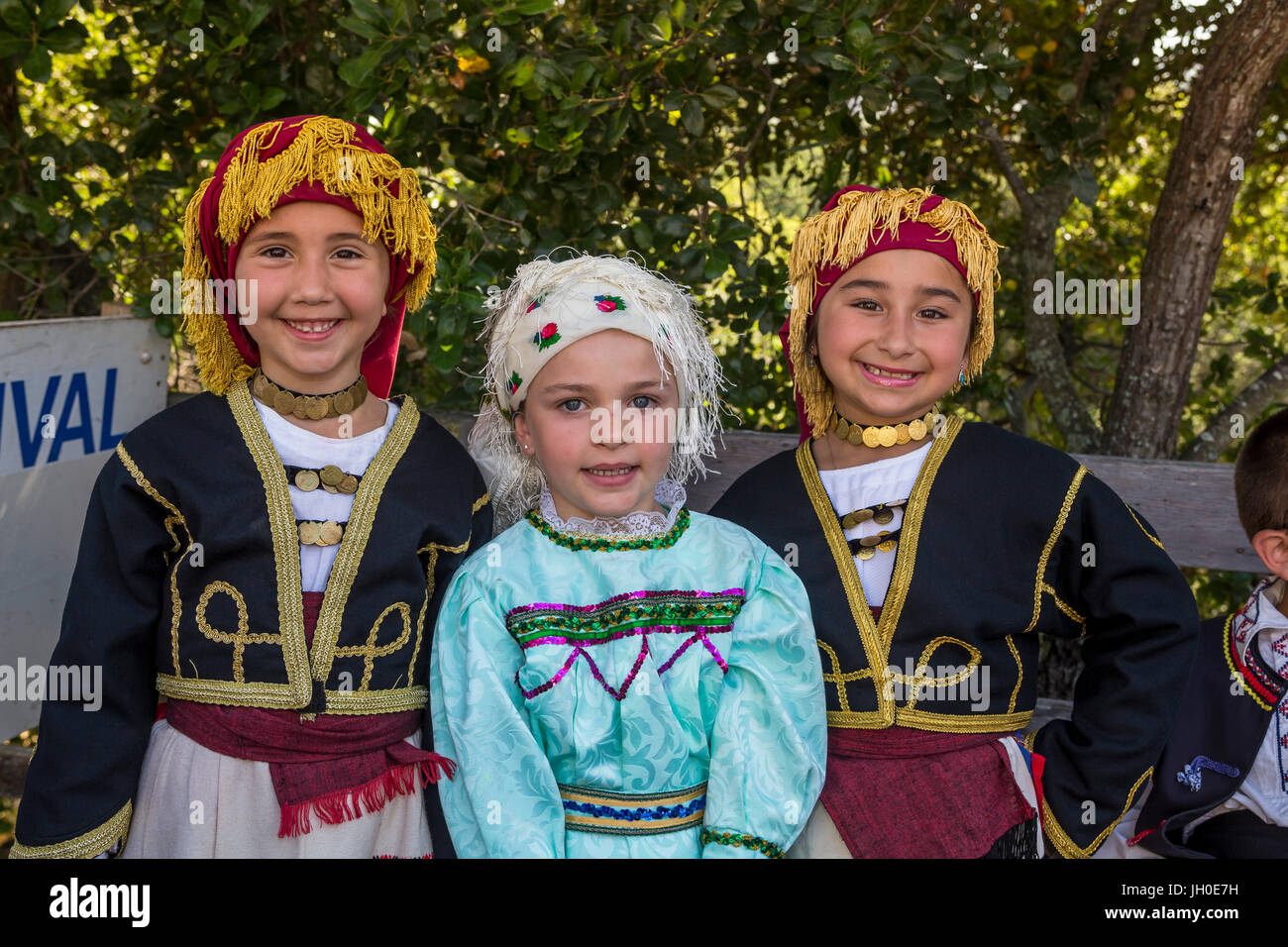 3, three, Greek-American girls, portrait, Greek folk dancers, traditional costume, Marin Greek Festival, city of Novato, Marin County, California Stock Photo