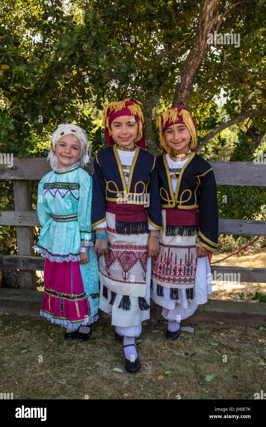 3, three, Greek-American girls, portrait, Greek folk dancers, traditional costume, Marin Greek Festival, city of Novato, Marin County, California Stock Photo