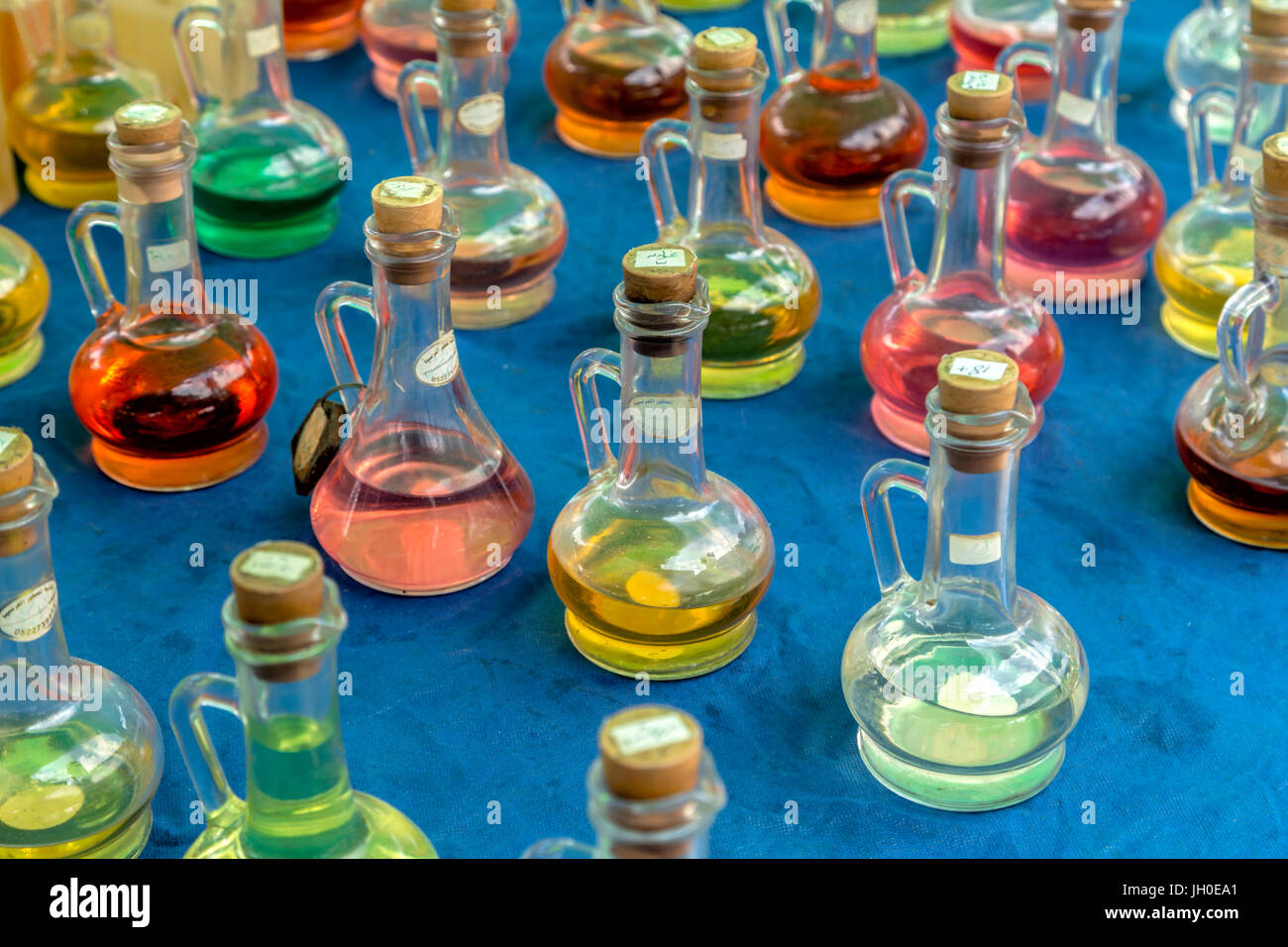 A colorful array of perfume bottles at a Druze market stall in Daliyat El Karmel, Haifa, district, Israel. Stock Photo