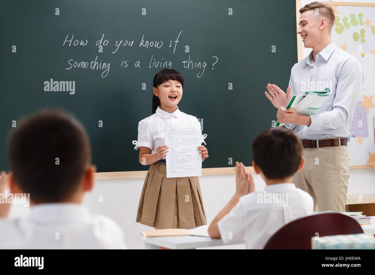 Teachers and pupils in the classroom Stock Photo - Alamy