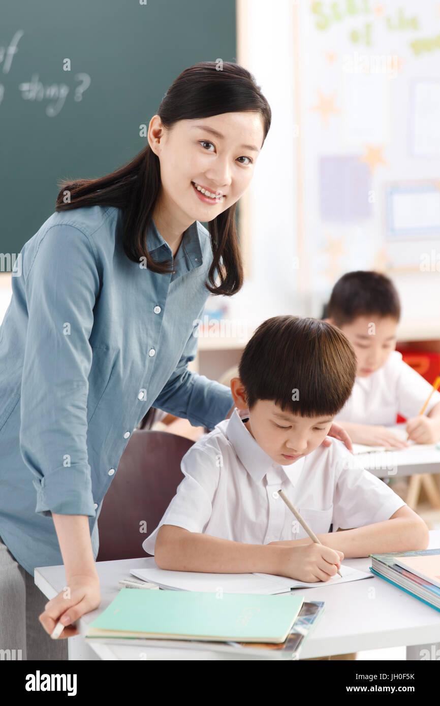 The teachers and pupils are in the classroom Stock Photo - Alamy