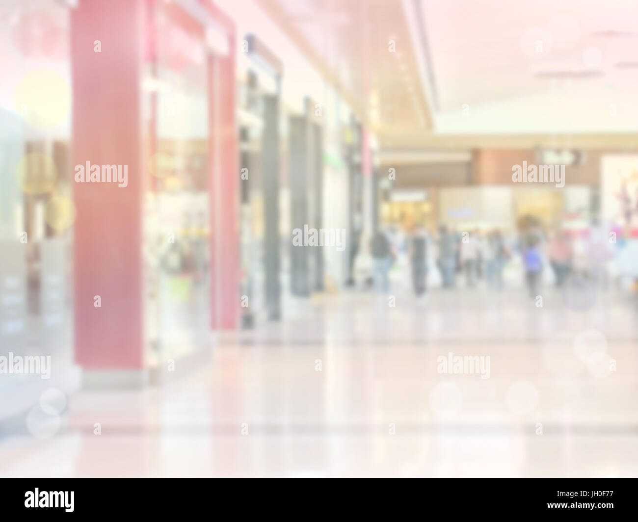 Abstract blurred shopping mall pink background with people and bokeh Stock Photo