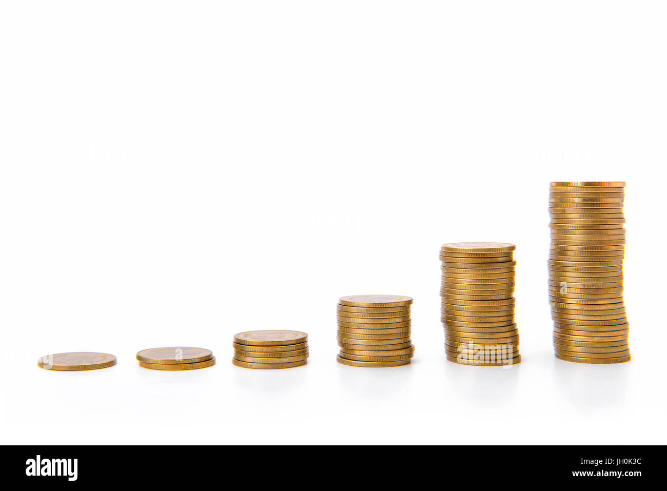 Saving money concept, coin stack growing business Stock Photo - Alamy