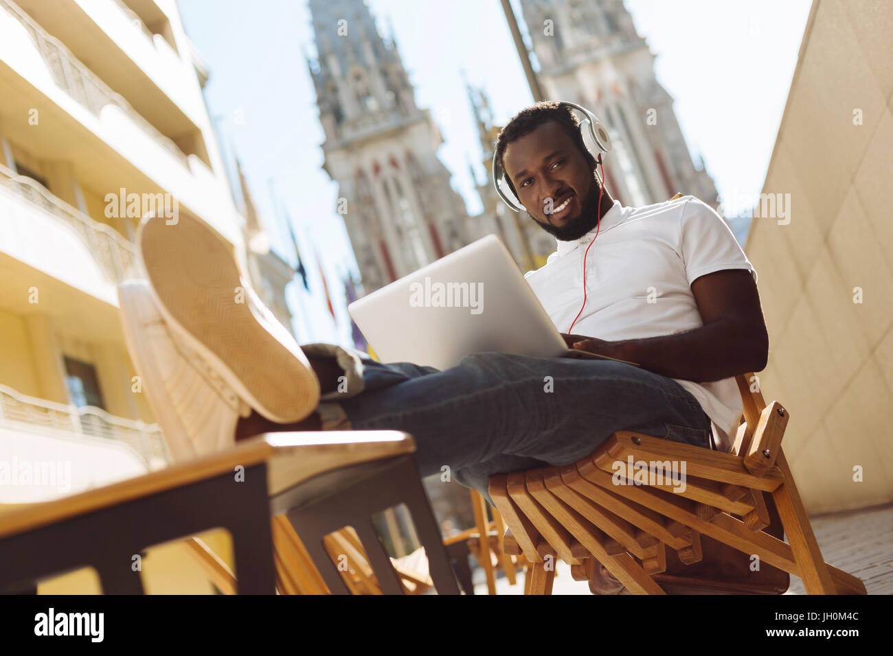 Awesome handsome man visiting public place for work Stock Photo