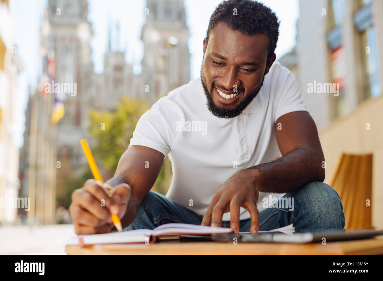 Optimistic organized man feeling inspiration Stock Photo