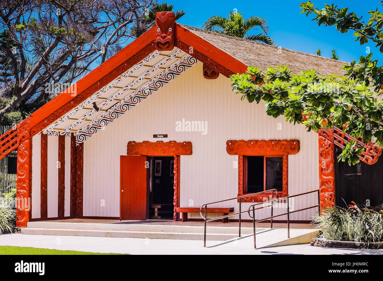 Honolulu, Hawaii - May 27, 2016: A Maori Meeting House in the Aotearoa Village at the Polynesian Cultural Center, a popular tourist attraction on Oahu Stock Photo