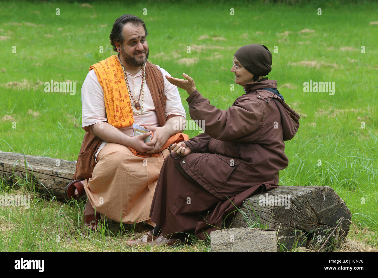 Dialogue in the garden of the Ramakrishna vedantic center. Gretz. France. Stock Photo