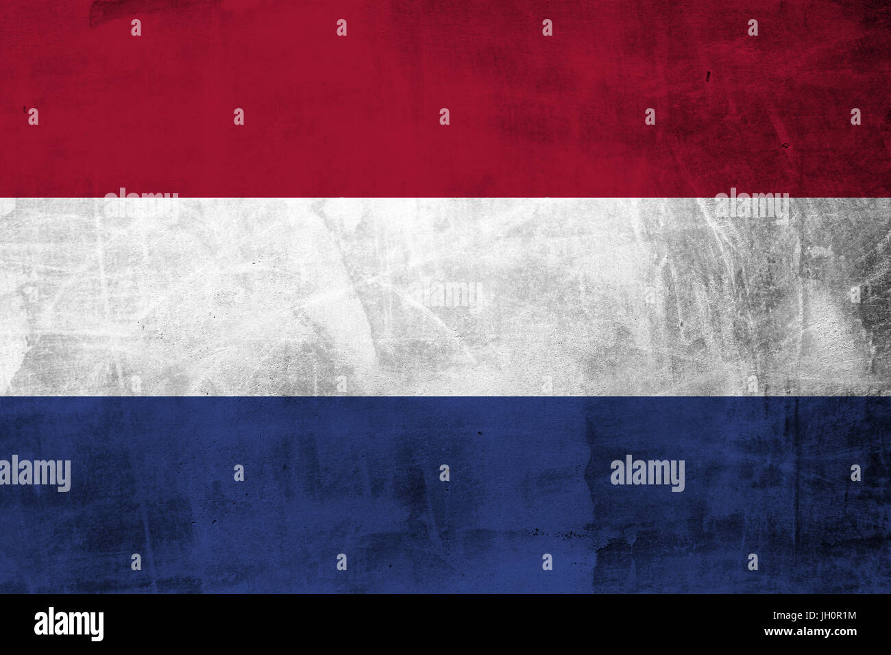 Grunge Netherlands Flag on concrete wall Stock Photo
