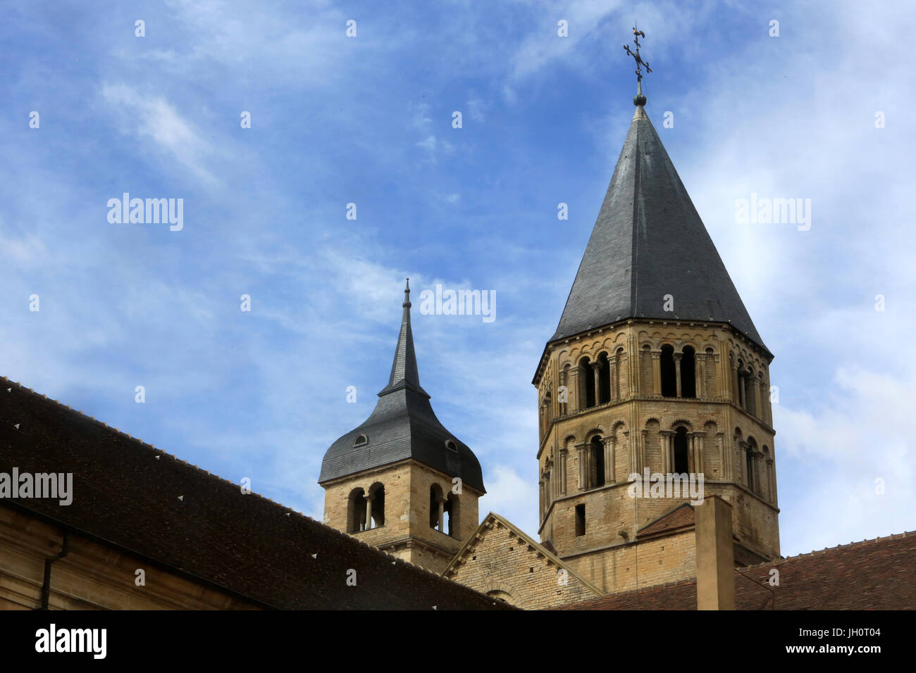 The bell tower of Holy Water and Tower Clock. Cluny Abbey. Cluny was founded in 910. France. Stock Photo