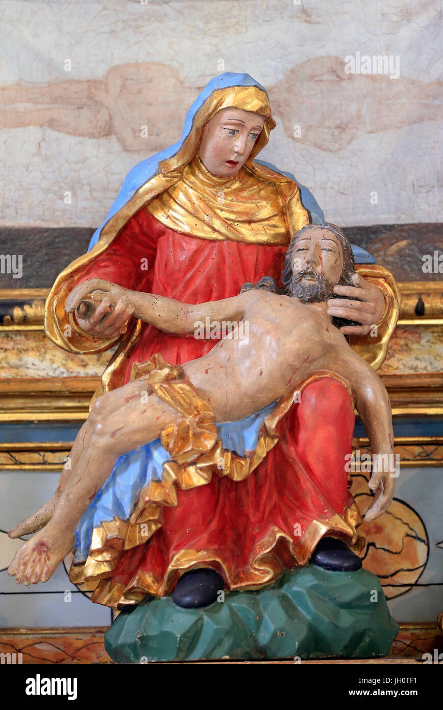 Pratz baroque chapel. Painted wood Pieta.  France. Stock Photo