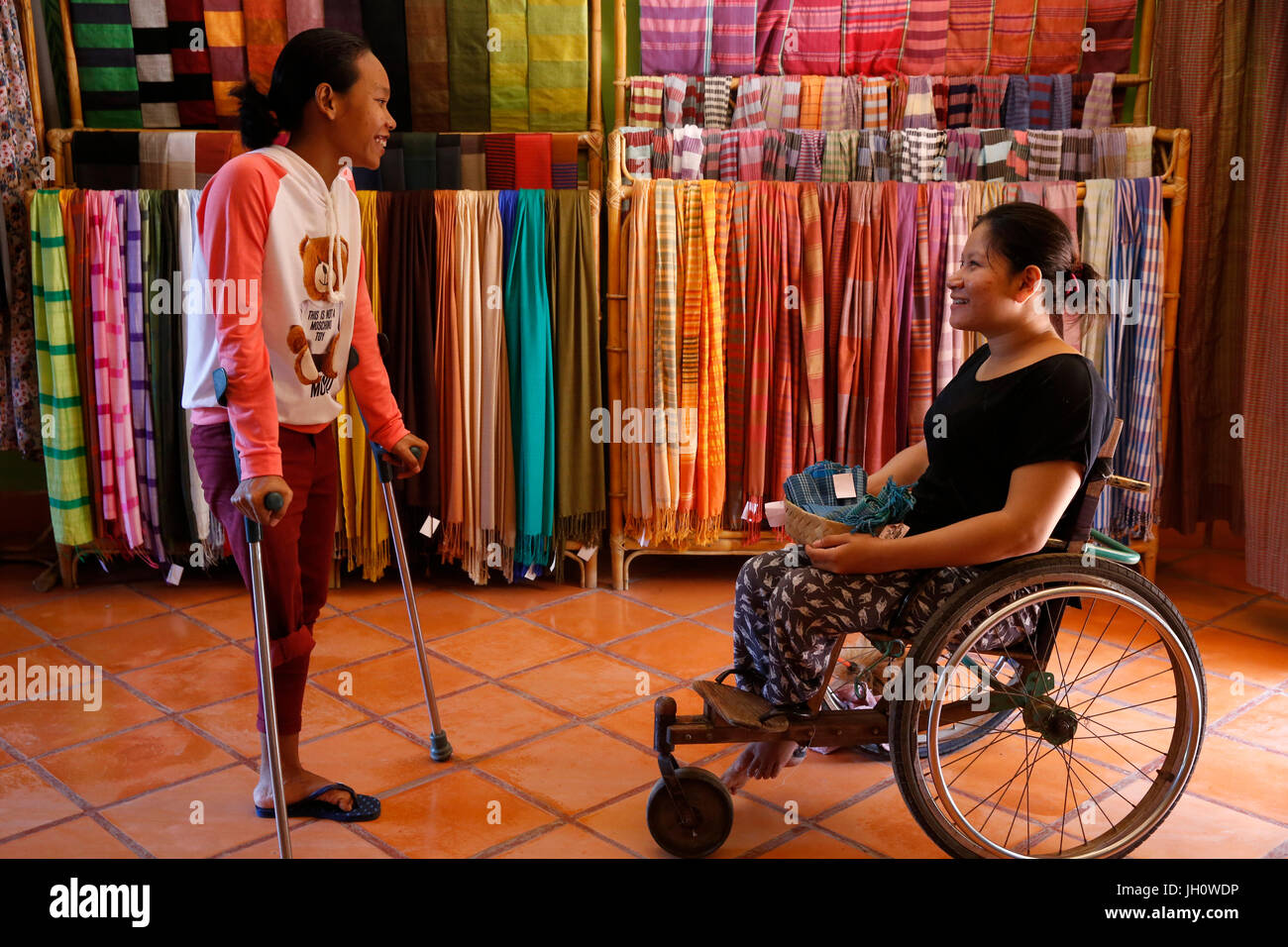 Disabled Cambodians in the Battambang catholic prefecture shop. Cambodia. Stock Photo