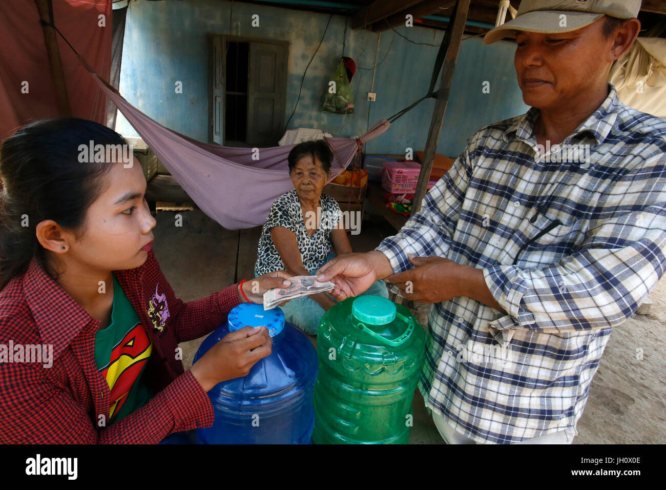 1001 Fountains water company home delivery and payment. Cambodia. Stock Photo