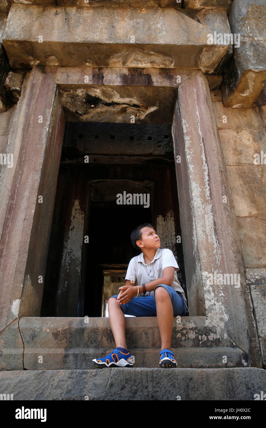 10-year-old boy visiting Angkor. Cambodia. Stock Photo