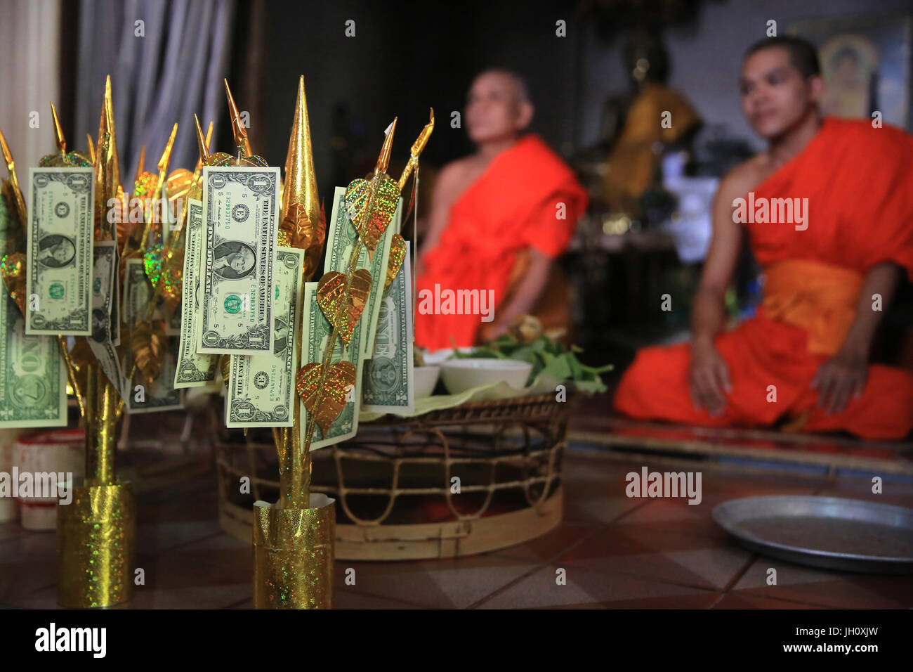 Buddhist money tree to make merit and donate to local temple. Wat Naxai. Vientiane. Laos. Stock Photo