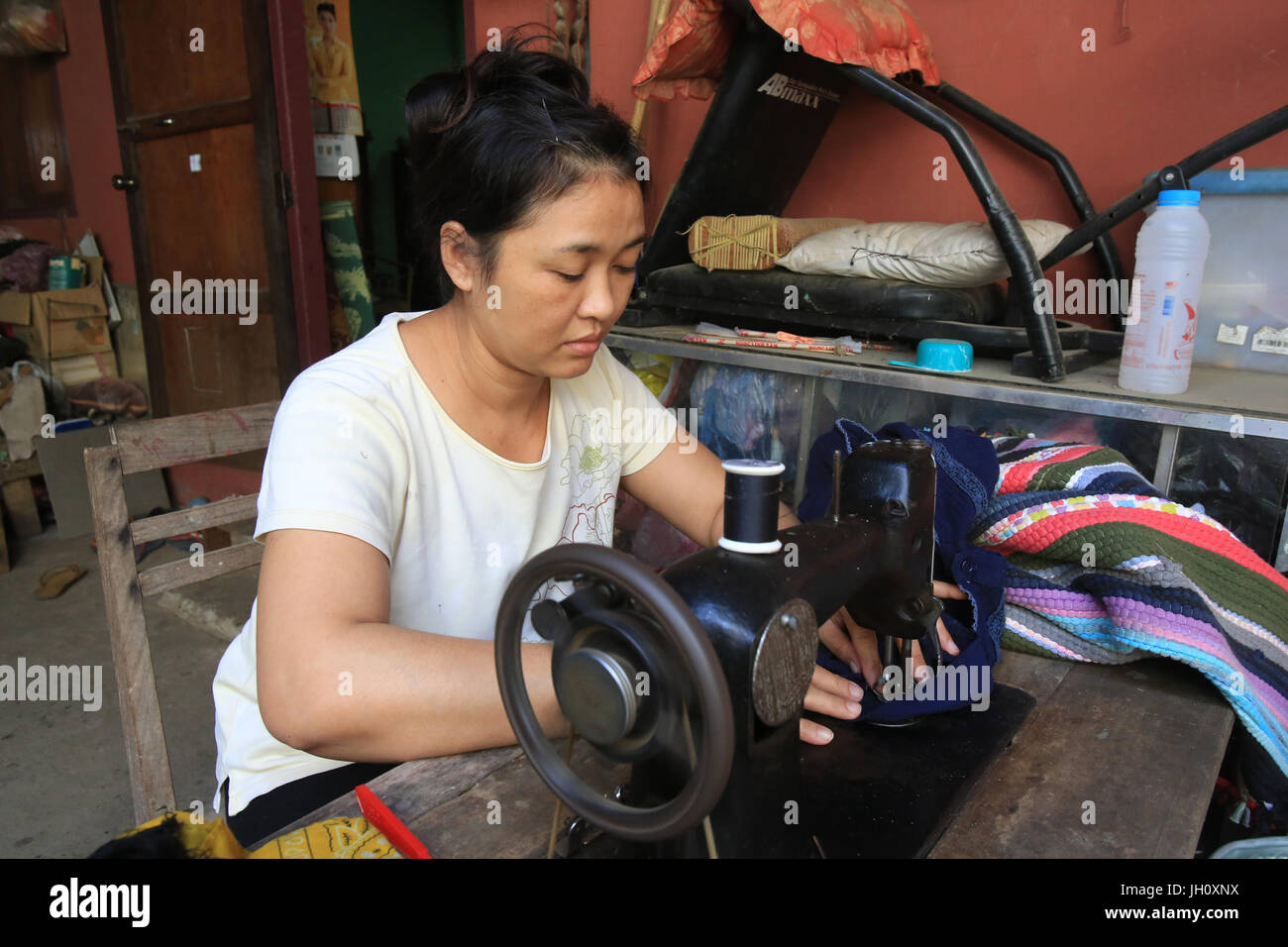 Sewing. Vang Vieng. Laos. Stock Photo