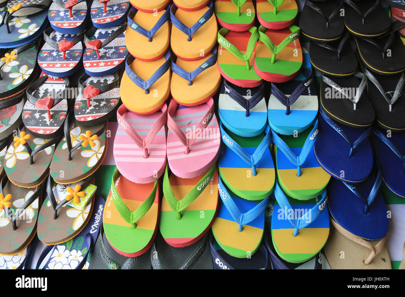 Multicolored flip flops at market. Vientiane. Laos. Stock Photo