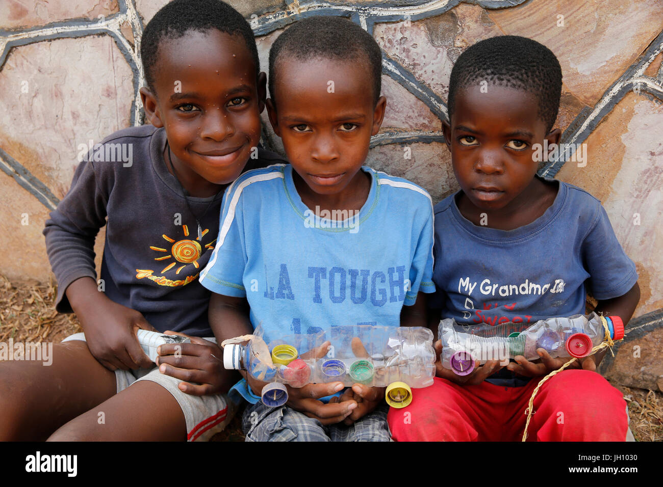 Ugandan children holding toys. Uganda Stock Photo Alamy