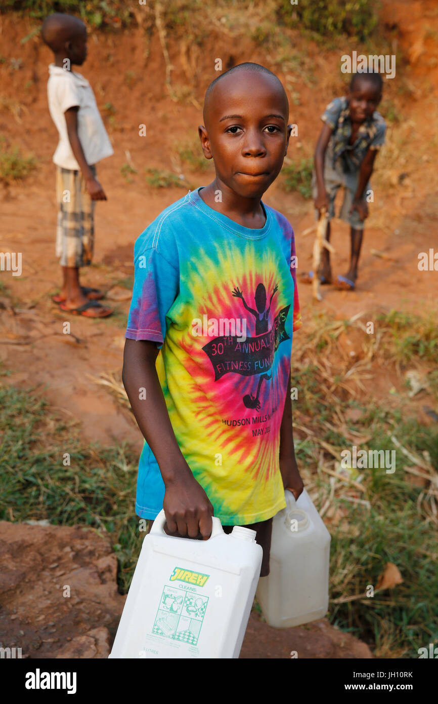 Fetching water in Mulago, Kampala. Uganda. Stock Photo