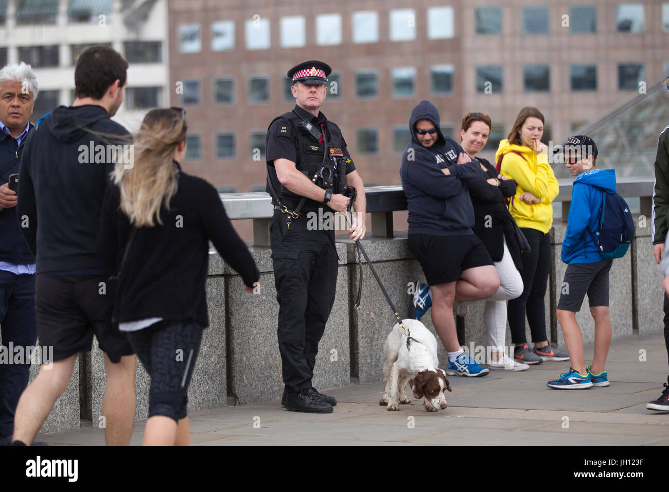 Metropolitan Police Dogs team on the London Bridge after the road is closed to traffic after the London Bridge Terror Attack, England, UK Stock Photo