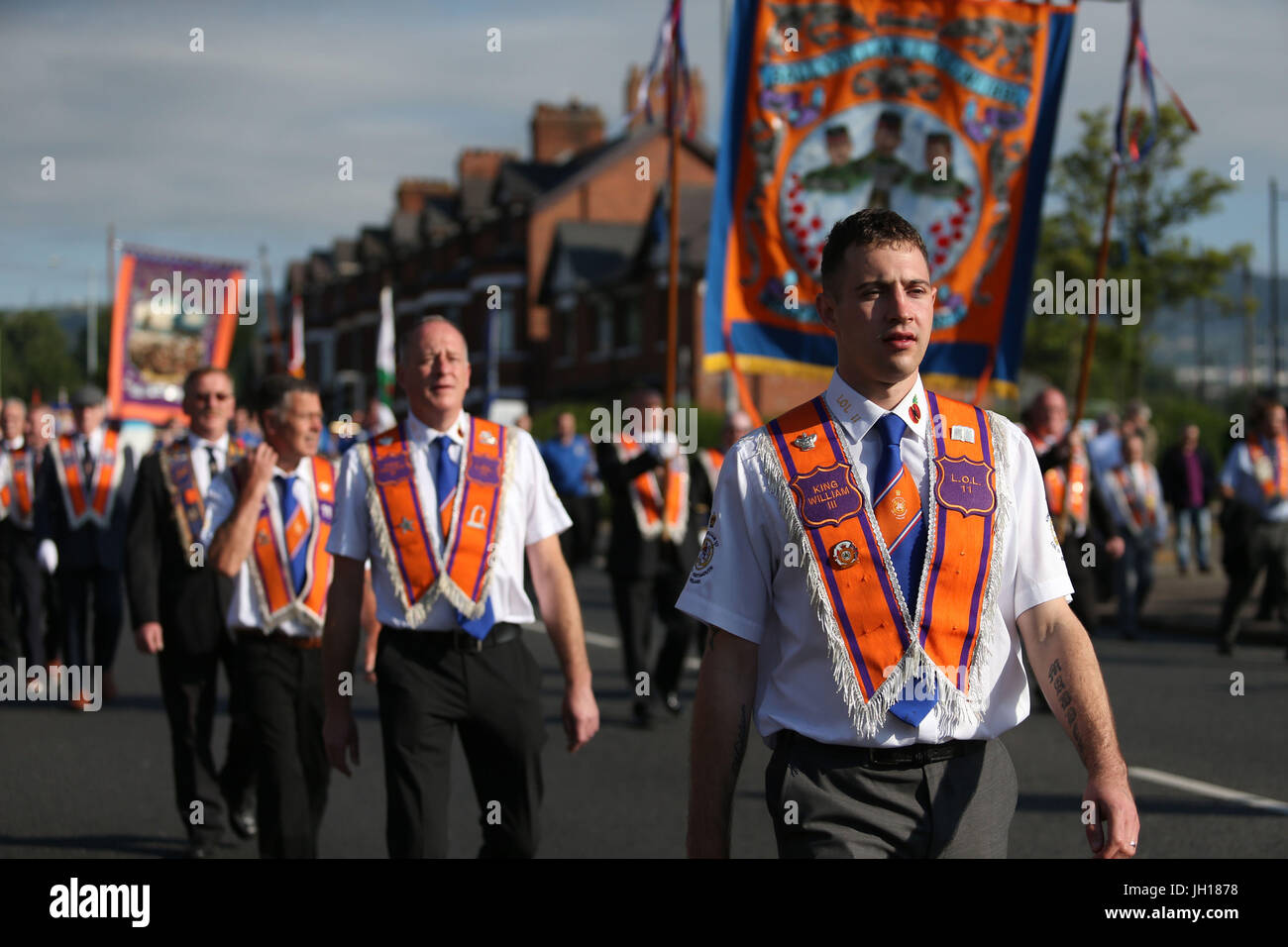 Orange order members march past ardoyne shops on crumlin road hires