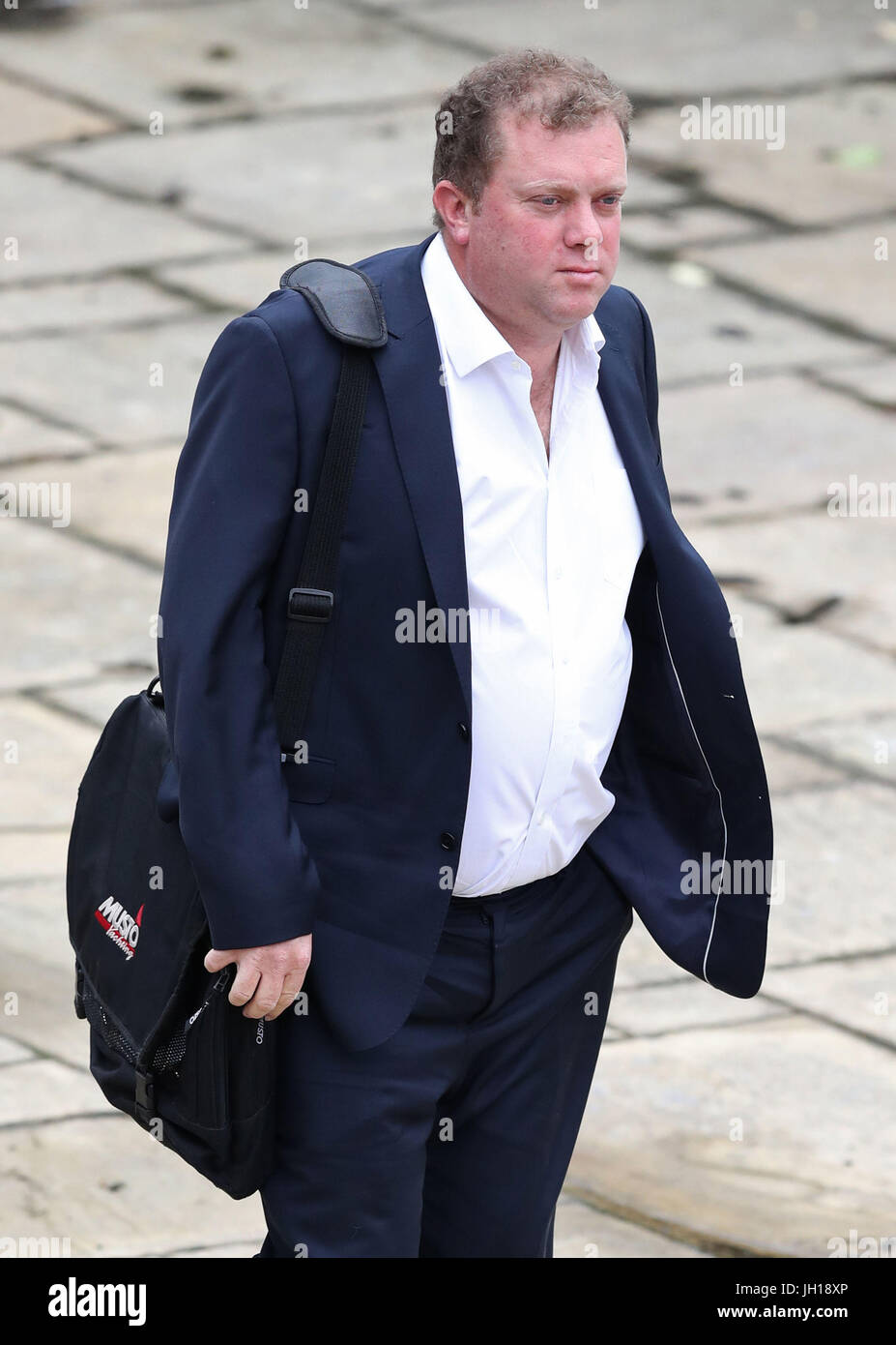 Douglas Innes arrives at Winchester Crown Court where the jury has retired in the trial of the yachting company boss who is accused of the manslaughter of the four crew of the Cheeki Rafiki who were lost at sea when it capsized mid-Atlantic. Stock Photo