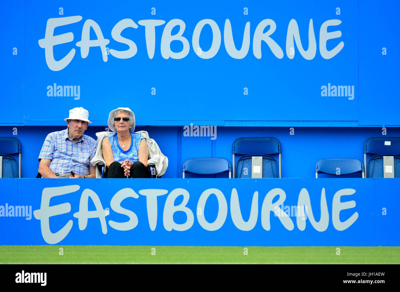 Aegon International tennis tournament, Devonshire Park, Eastbourne 2017. Older spectators sitting in special easy access seating for the elderly and... Stock Photo