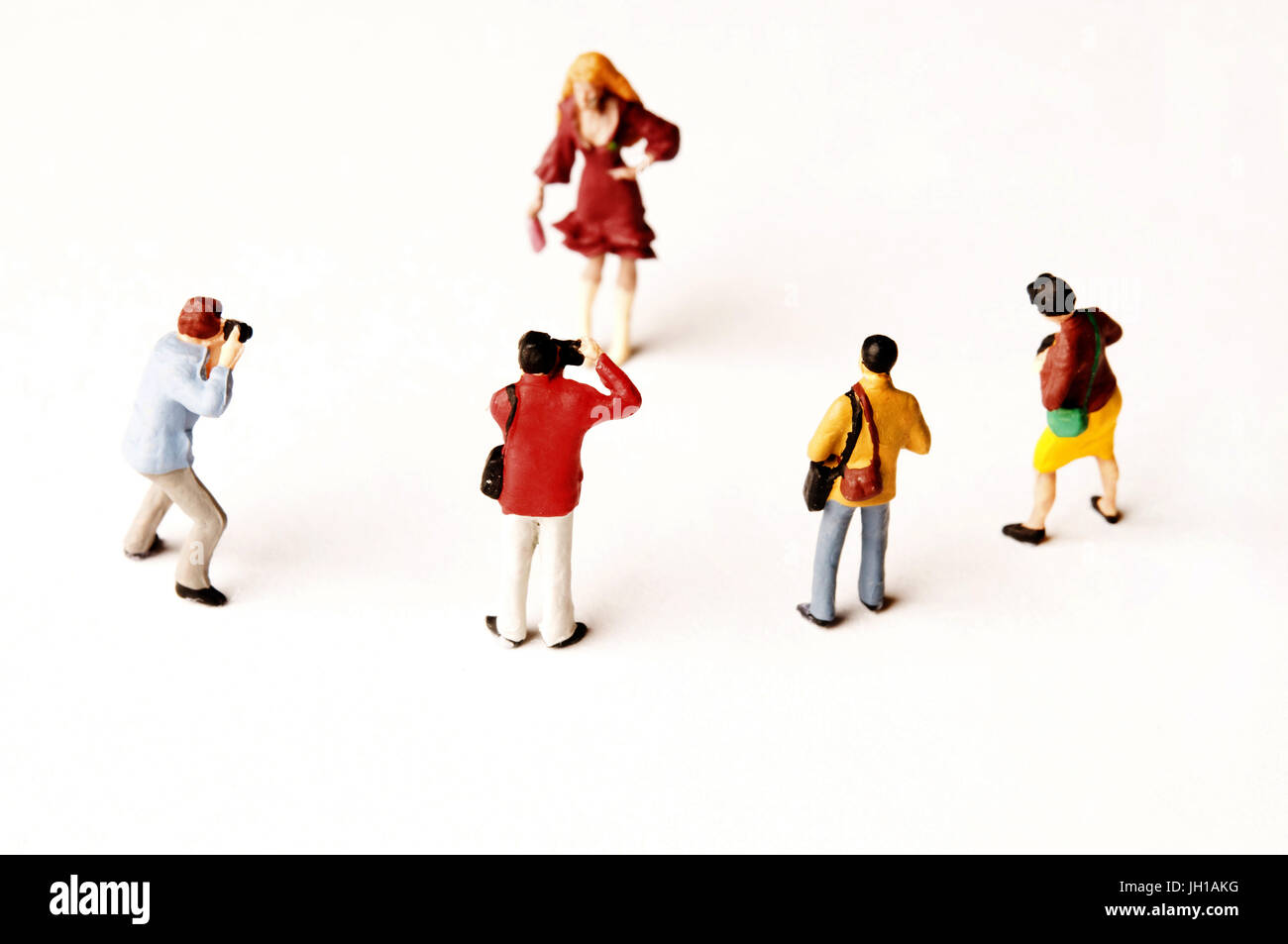 miniature figurines, model and photographers concept Stock Photo Alamy