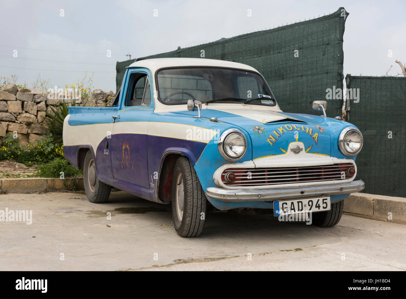 An old austin a55 pick up car or truck in Malta Stock Photo