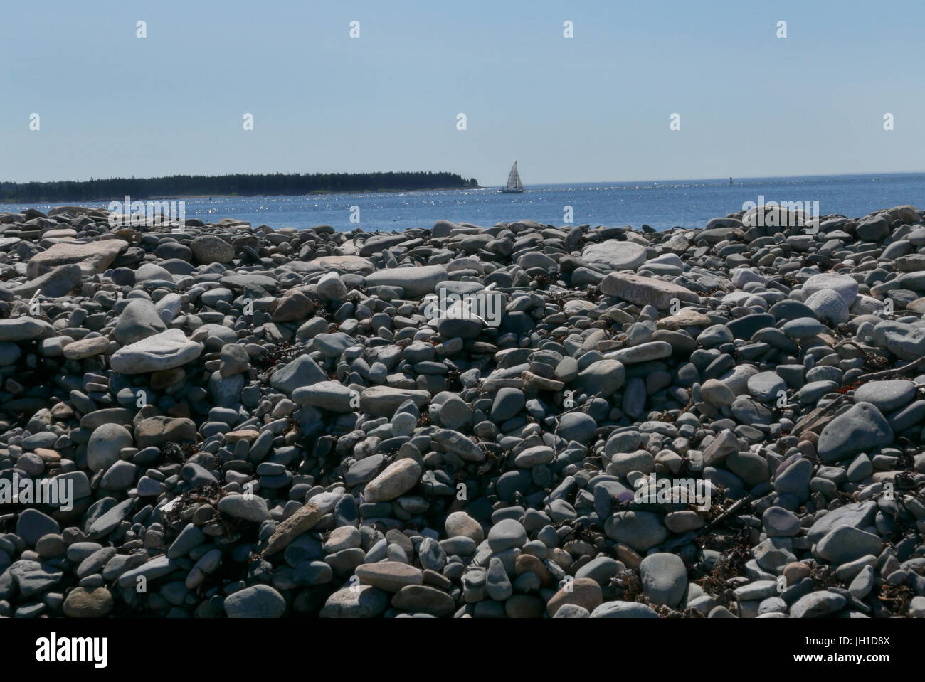 A natural seawall of granite boulders  at Seawall on Mt Desert Island Maine Stock Photo