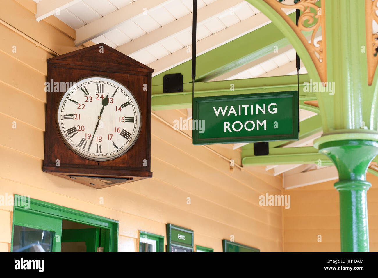 vintage public transport waiting room and large antique clock Stock Photo