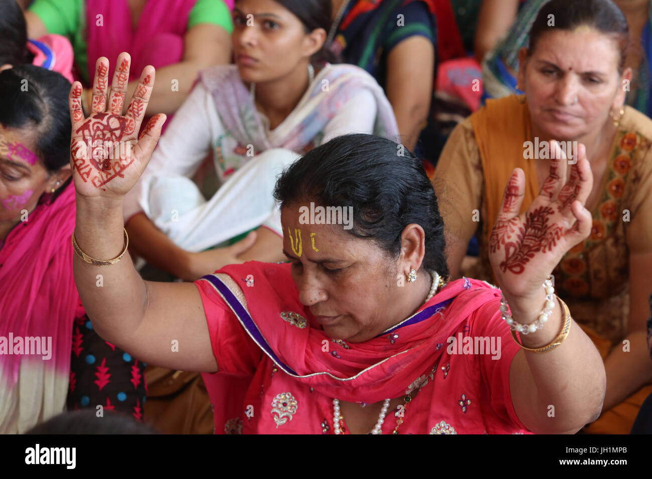Prayers and chanting in Radha Rani temple, Barsana, Uttar Pradesh. India. Stock Photo