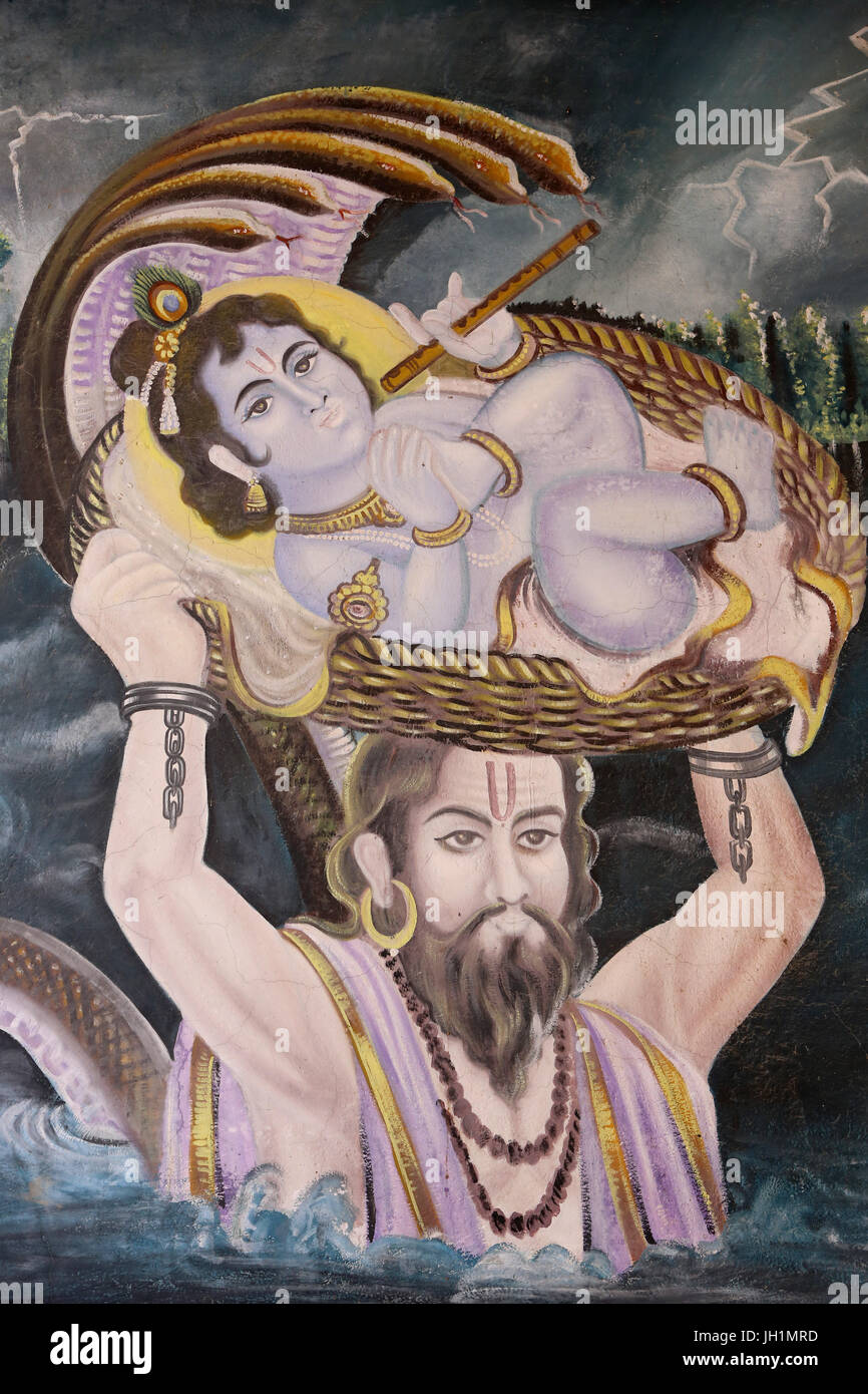 Painting in Gokul : Krishna as a baby carried over the Yamuna River by Vasudeva. India. Stock Photo