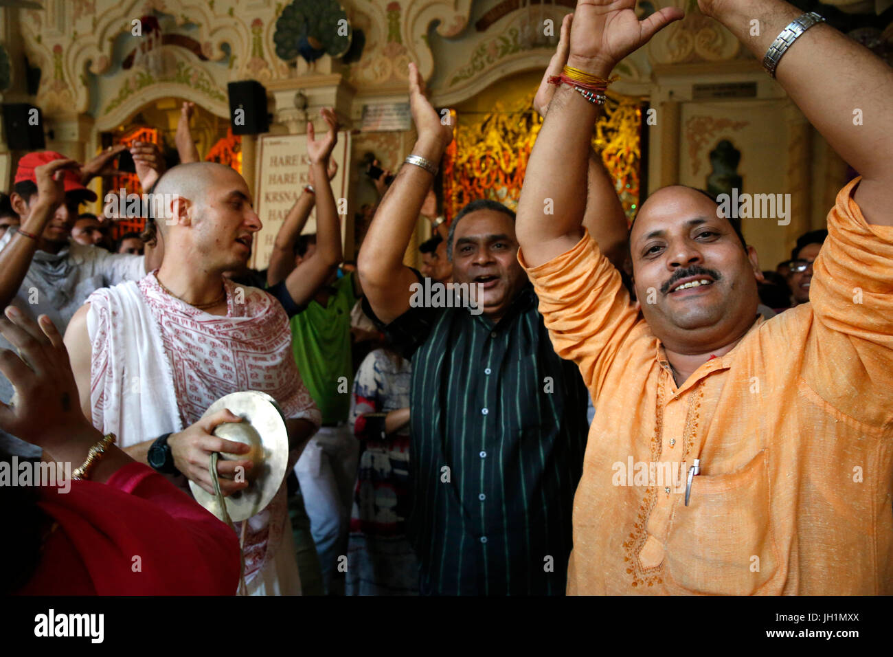 Dancing and chanting at Krishna-Balaram temple, Vrindavan, Uttar Pradesh. India. Stock Photo