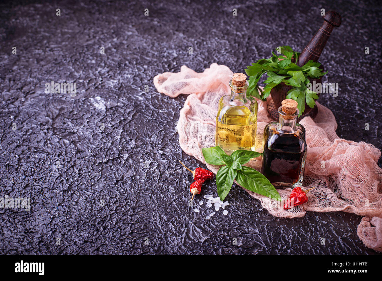 Olive oil and vinegar in glass bottles. Selective focus Stock Photo Alamy