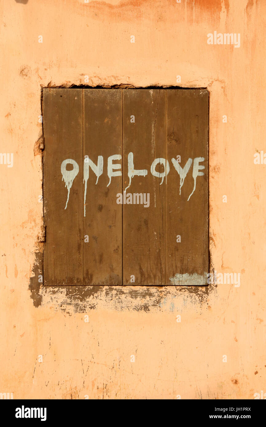 Graffiti on a wall : one love.    Togoville. Togo. Stock Photo